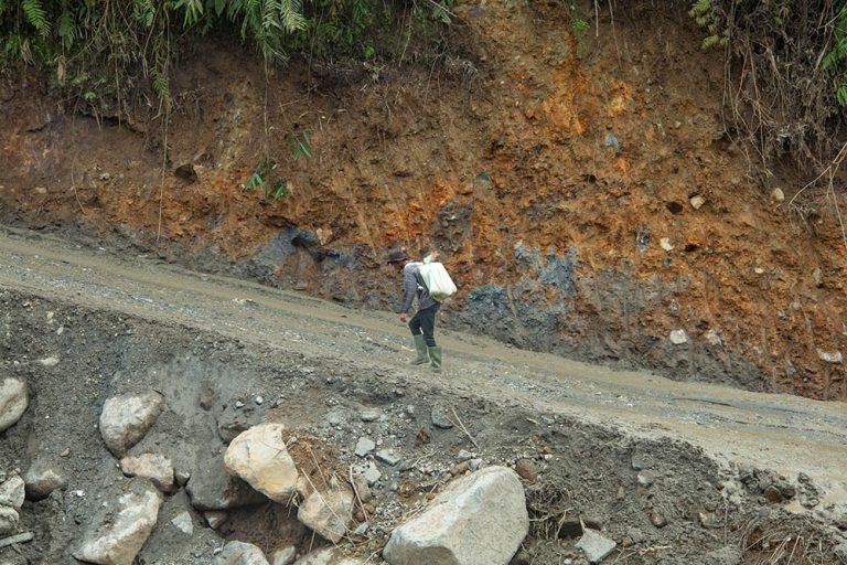 Bener Meriah Villagers Carry Basic Needs on Damaged, Landslide-Prone, and Hilly Roads